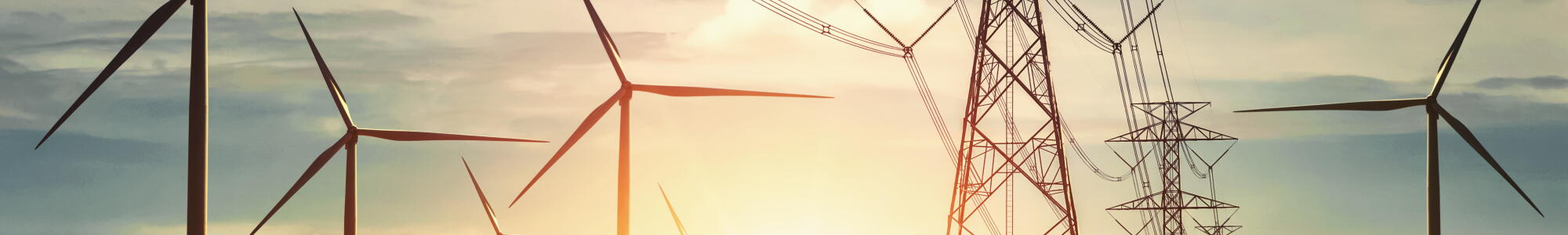 Solar panels, wind turbines and electricity towers